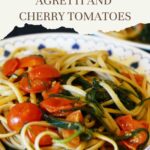 Pinterest image with image of spaghetti with agretti and cherry tomatoes dish and caption reading "Spaghetti with agretti and cherry tomatoes"